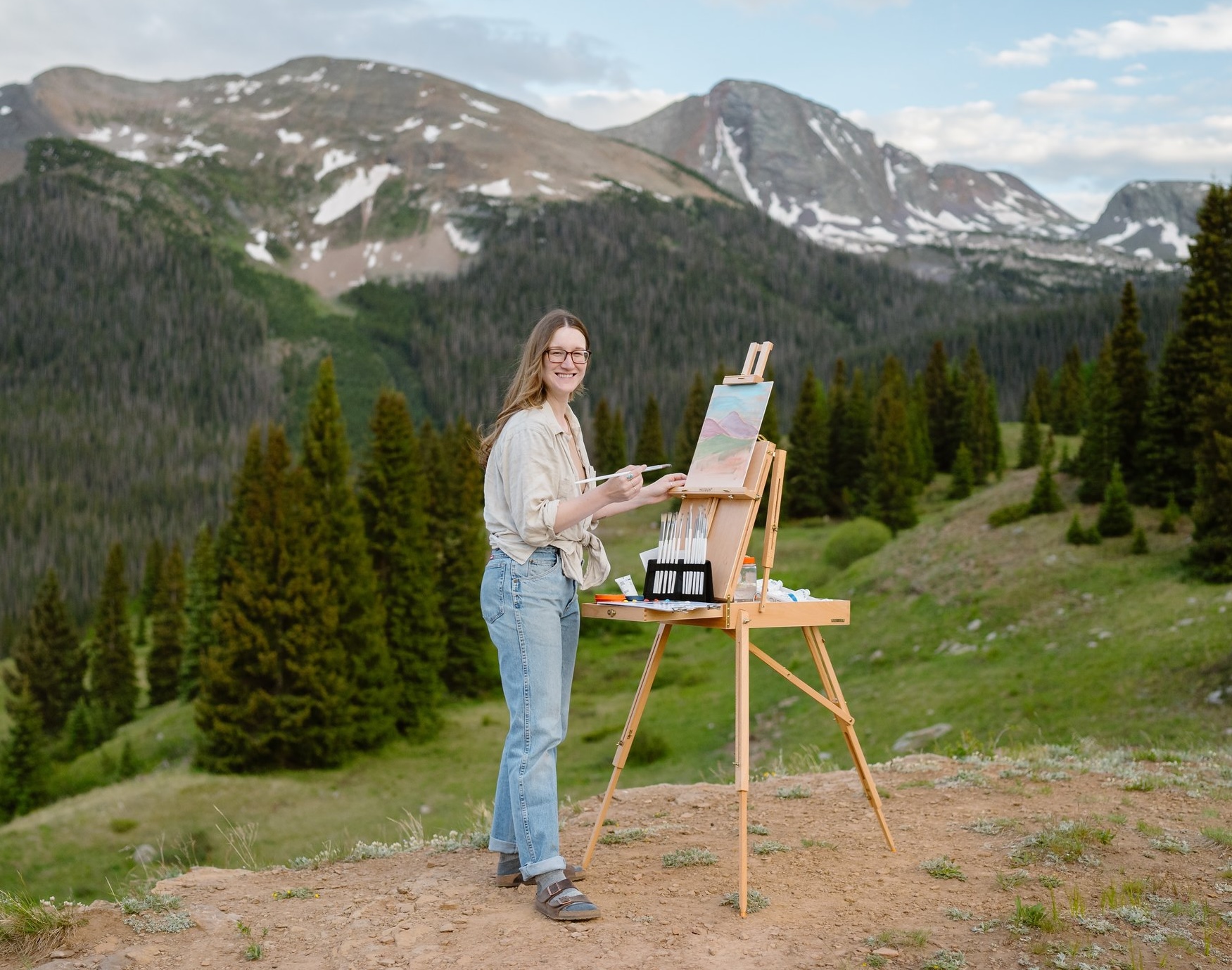 Jaclyn painting outdoors in Colorado
